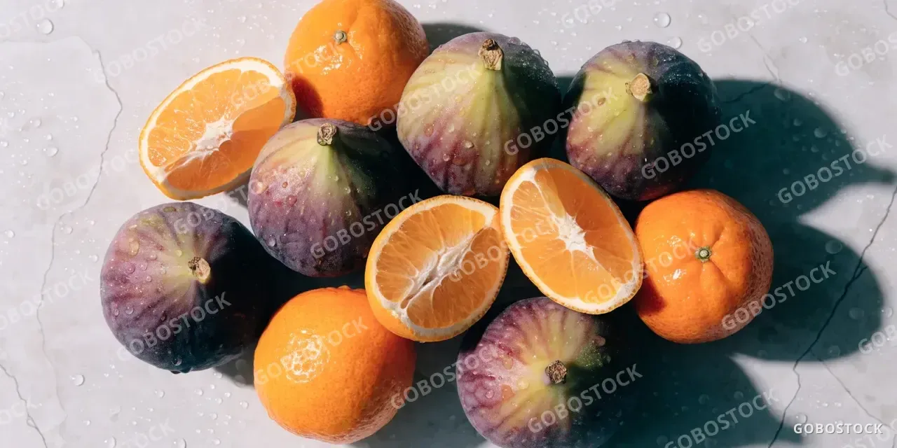 Fresh figs and citrus overhead — AI-generated image made with Recraft V4.1 on Gobostock